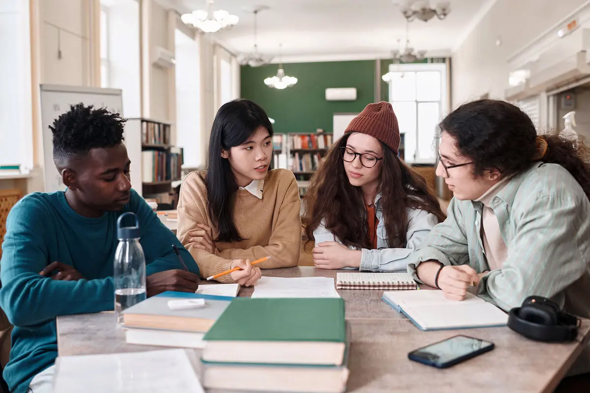 Students collaborating in a library